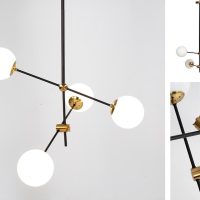 Lámpara de techo metal negro con detalles dorados.